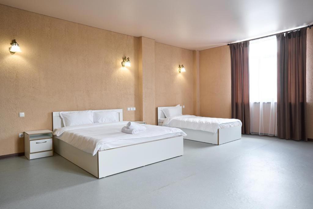 אלמטי 7Days Hotel מראה חיצוני תמונה