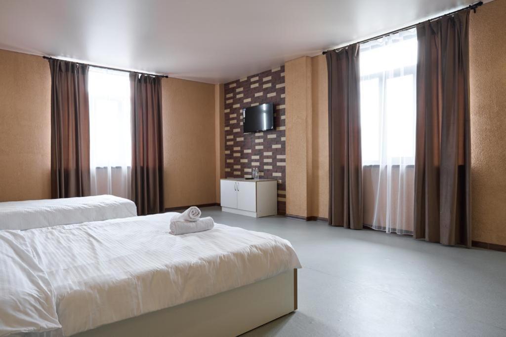 אלמטי 7Days Hotel מראה חיצוני תמונה
